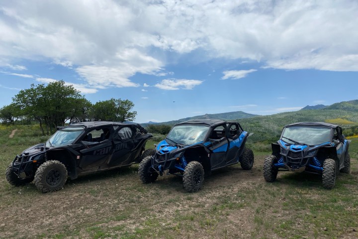 a car parked in a grassy field
